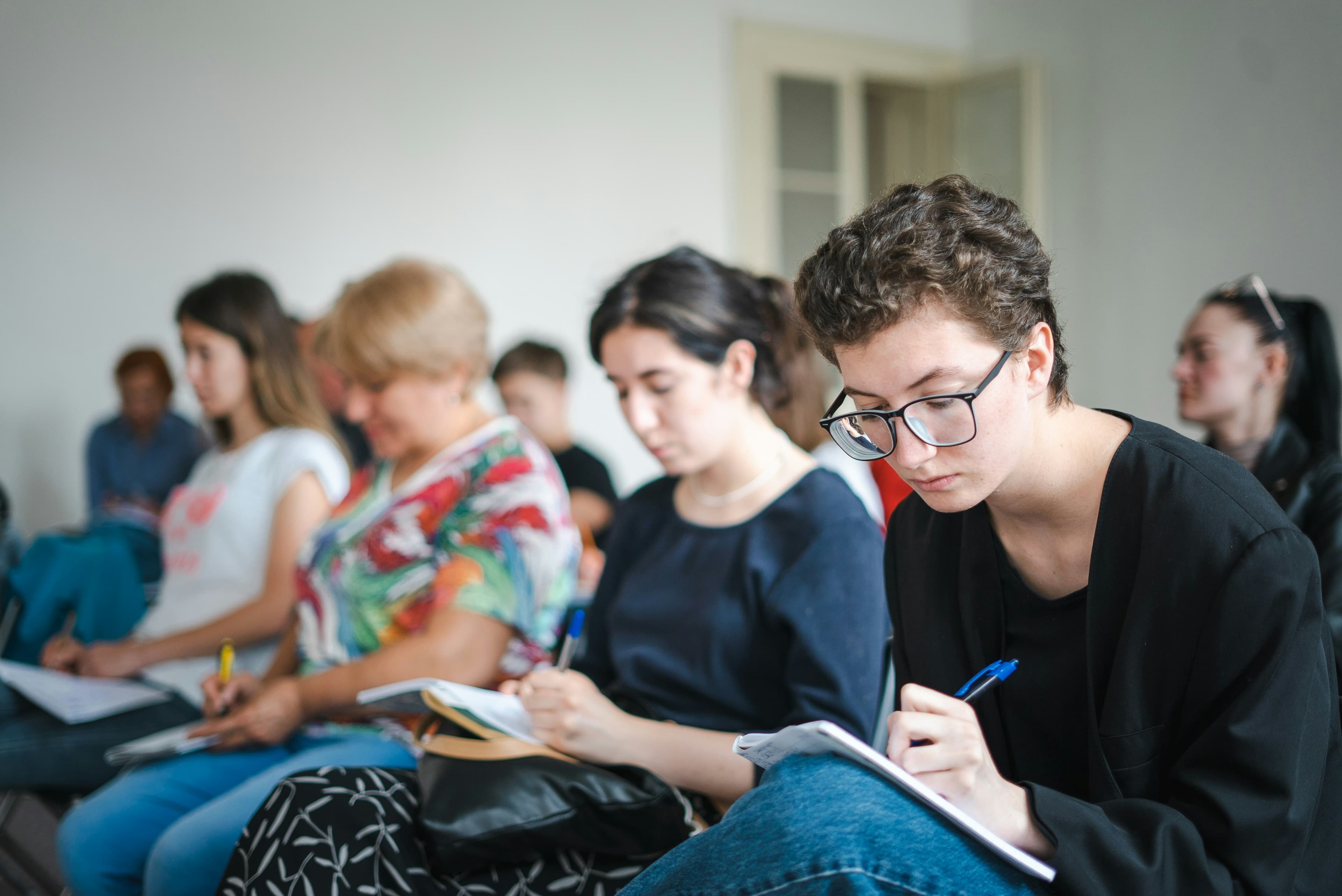 Diverse adult learners building workplace skills together